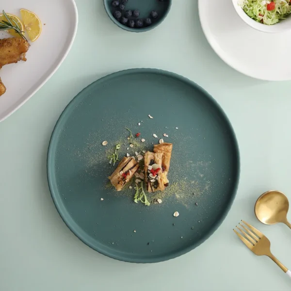 Hd4e742d4ac1e4b8b8de3407b70409d70E.webp Simple Design Hotel Restaurant Matte Dark Green White Porcelain Plate Set Nordic Ceramic Dinnerware Set